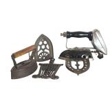 LR - Vintage Cast Iron Irons, Iron Stands and Ornate Trivet