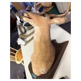Singing buck wall mount with remote and microphone