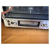 8-track and record player with 8 track tapes