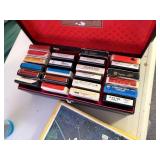 8-track and record player with 8 track tapes