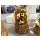 Set of three Snow globe nativity scene
