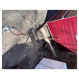 Dark house on skis with attached pull cable