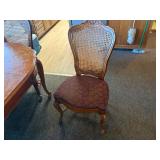 Dining room table with padded chairs