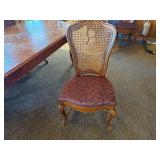 Dining room table with padded chairs
