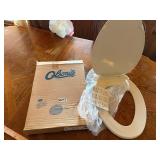 New in box toilet seat