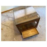 Glass top wooden nightstand with drawer