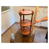 Round wooden shelving with decorative posts