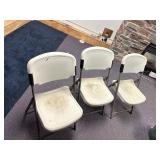 Plastic white folding chairs