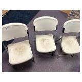 Plastic white folding chairs