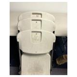 Plastic white folding chairs