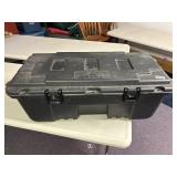 Hard plastic Plano tub with latching lid