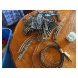 Large assortment of old model trains, tracks, and accessories