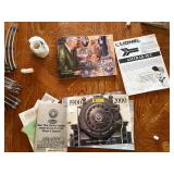 Large assortment of old model trains, tracks, and accessories