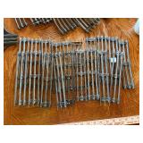 Large assortment of old model trains, tracks, and accessories