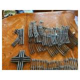 Large assortment of old model trains, tracks, and accessories