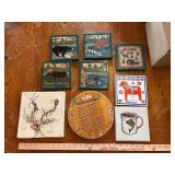 Rustic ceramic tile trivets of wildlife and cabin scenes