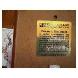 Rustic ceramic tile trivets of wildlife and cabin scenes