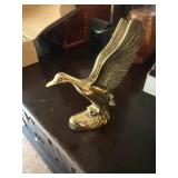 Brass flying duck statue