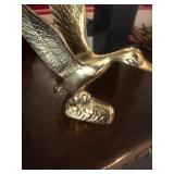 Brass flying duck statue