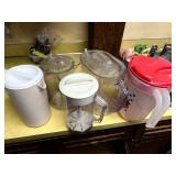 Assortment of pitchers with lids