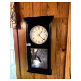 Wall clock with eagle depiction
