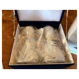 New in box silver platted gravy bowl and candlesticks