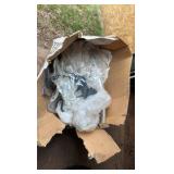 box of hangers and horse decorations