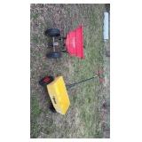 two spreaders one manual one with hitch