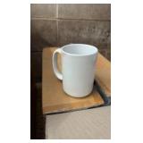 two boxes containing mighty mug 15 ounce coffee cups