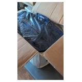 box of button-up cotton shirts