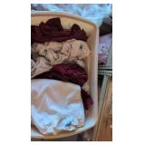 box of t-shirts and sweatshirts