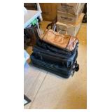 three travel suitcases