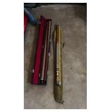 two pool sticks in cases