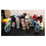 hodgepodge of oil and other random liquids in a green bucket