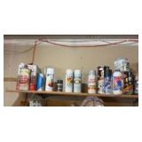 contents of shelf including various gloss and enameling liquids