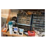 shelf contents including various screws, bolts, and nails