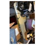 three plastic folding tables