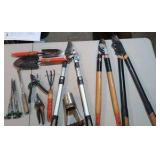 assortment of garden tools and snips