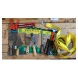 catch all masonry hand tools sandpaper and ratchet strap tie down
