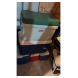 five coolers of different sizes