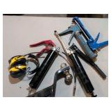 Grease gun ear protection, caulk gun and trailer hitch