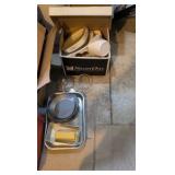 box of household dishware and pans