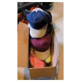 box of hats that are still tagged