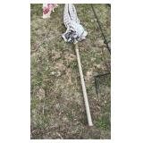 lot of outdoor decorations, including an umbrella, howling, dog statues, and wind catchers
