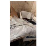 lot of Port Authority button up shirts in various sizes and various color T-shirts