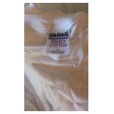 box of Gildan t-shirts