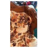 two wooden chairs with design