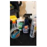 hodgepodge of oil and other random liquids in a green bucket