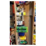 shelf contents including:- various scrubbing- bug killing- ice packs- acrylic primer- spray adhesive- bone meal