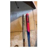 two metal baseball bats